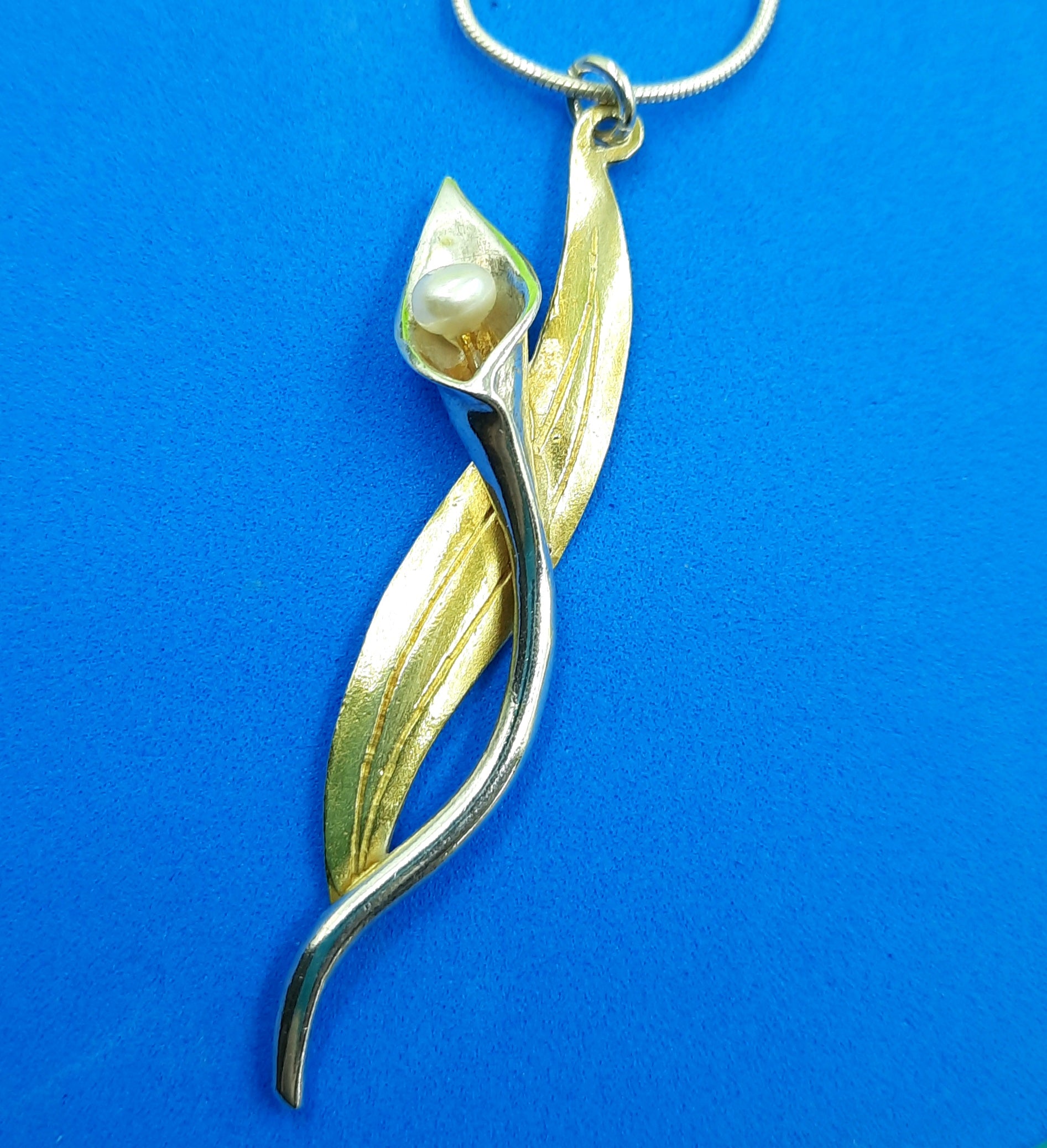 Sterling silver lily pendant with gold plating