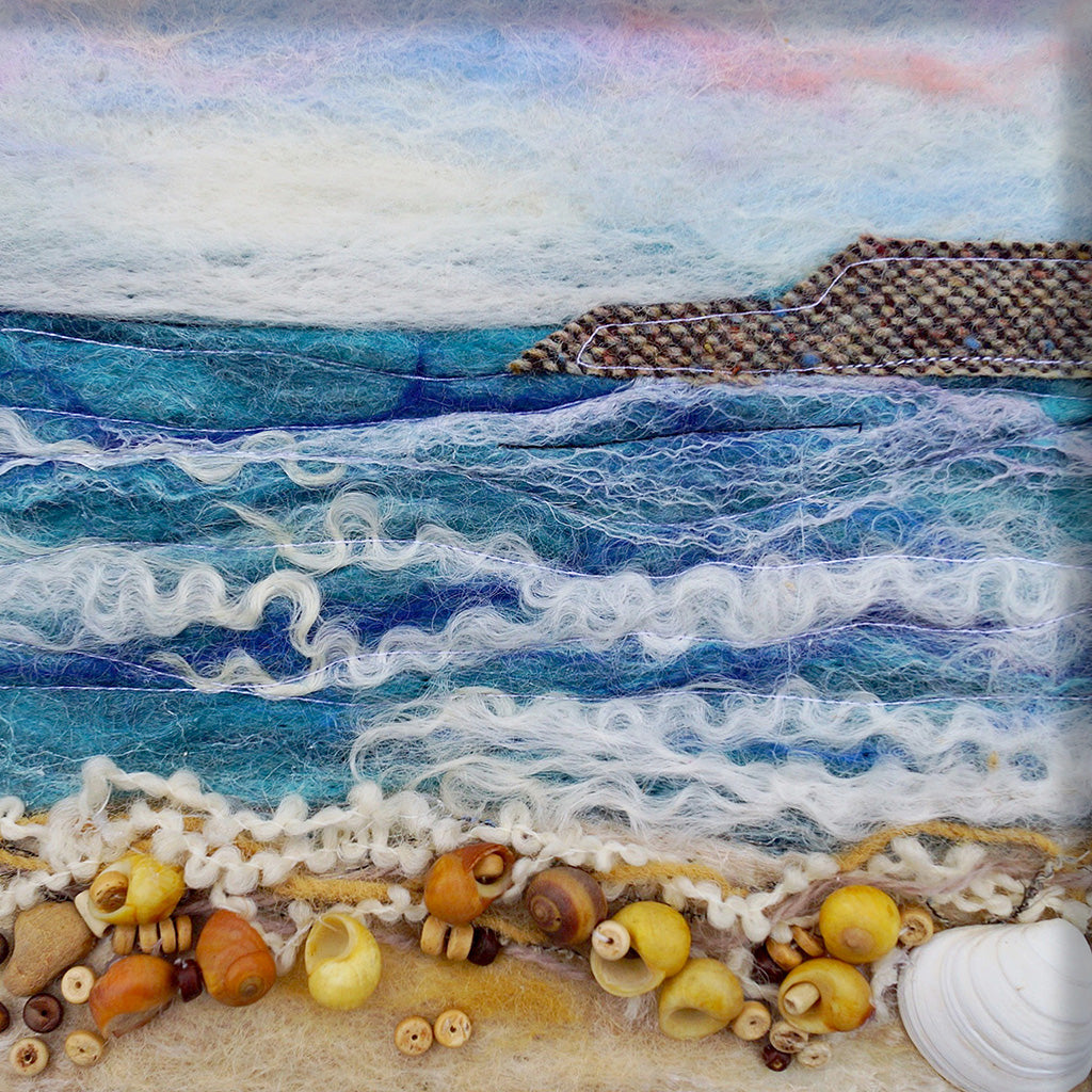 this card depicts an Irish beach scene located along the Atlantic coast complete with rolling waves and shells.  Professional printed copy from original hand felted artwork.