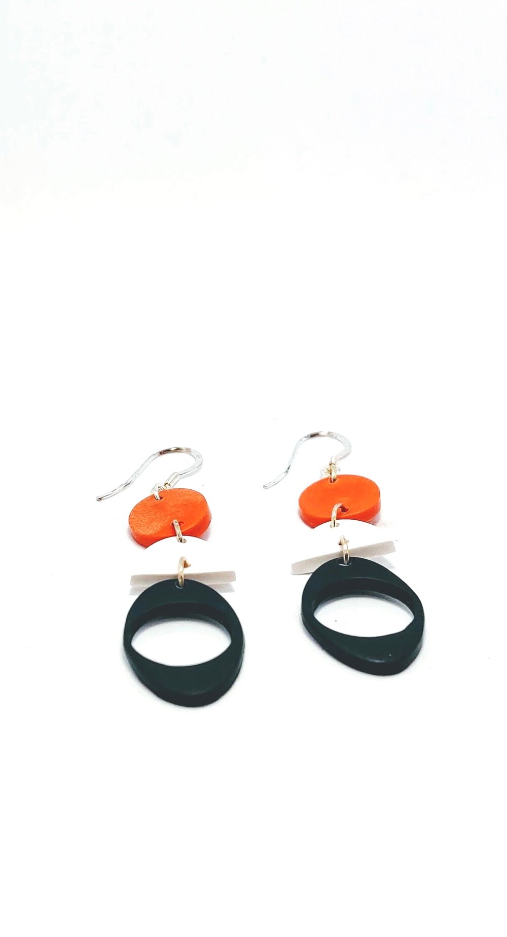 Dangle earrings in Navy Blue, white and orange geometric shapes