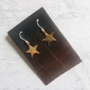 Star Earrings, heat patinated copper with rainbow colours. Easily worn with silver ear findings.